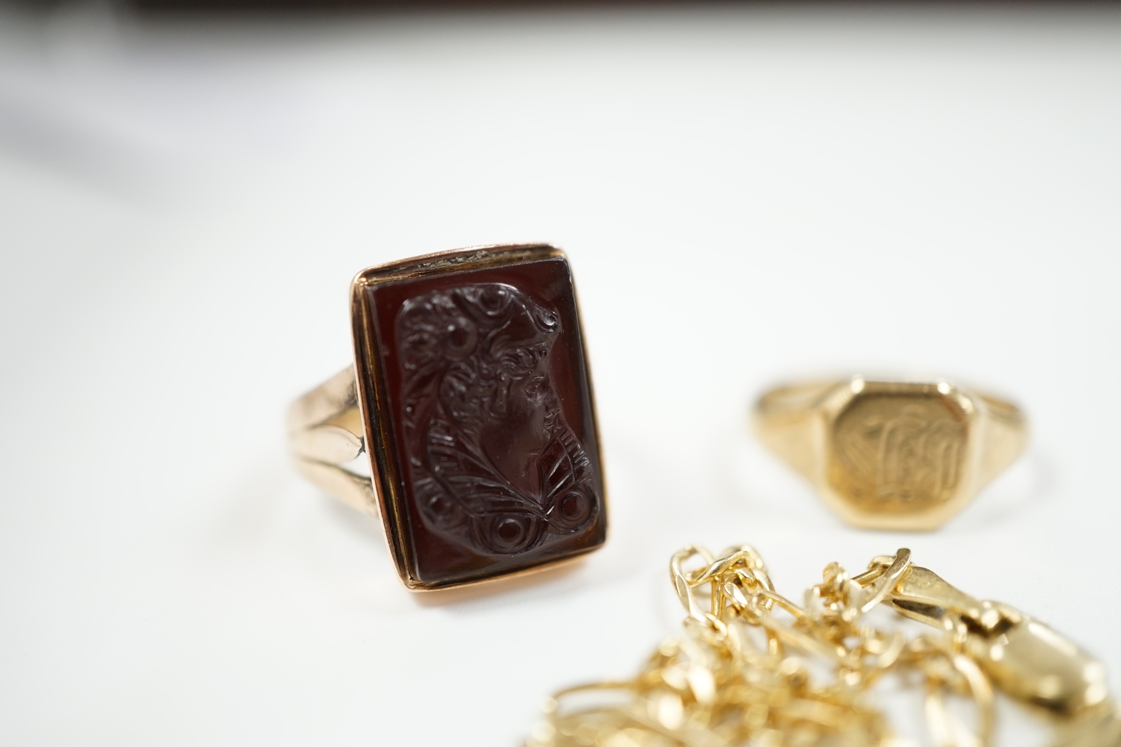 A modern 9ct gold and hardstone cameo set ring, size M, a small 9ct gold signet ring and an Italian 14kt bracelet